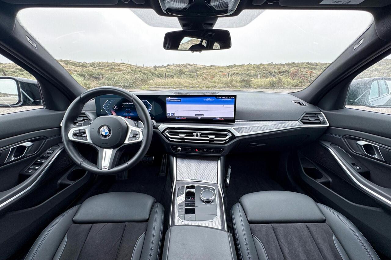 BMW 3-SERIE Touring 318i | M Sport | Stoelverwarming | Trekhaak |