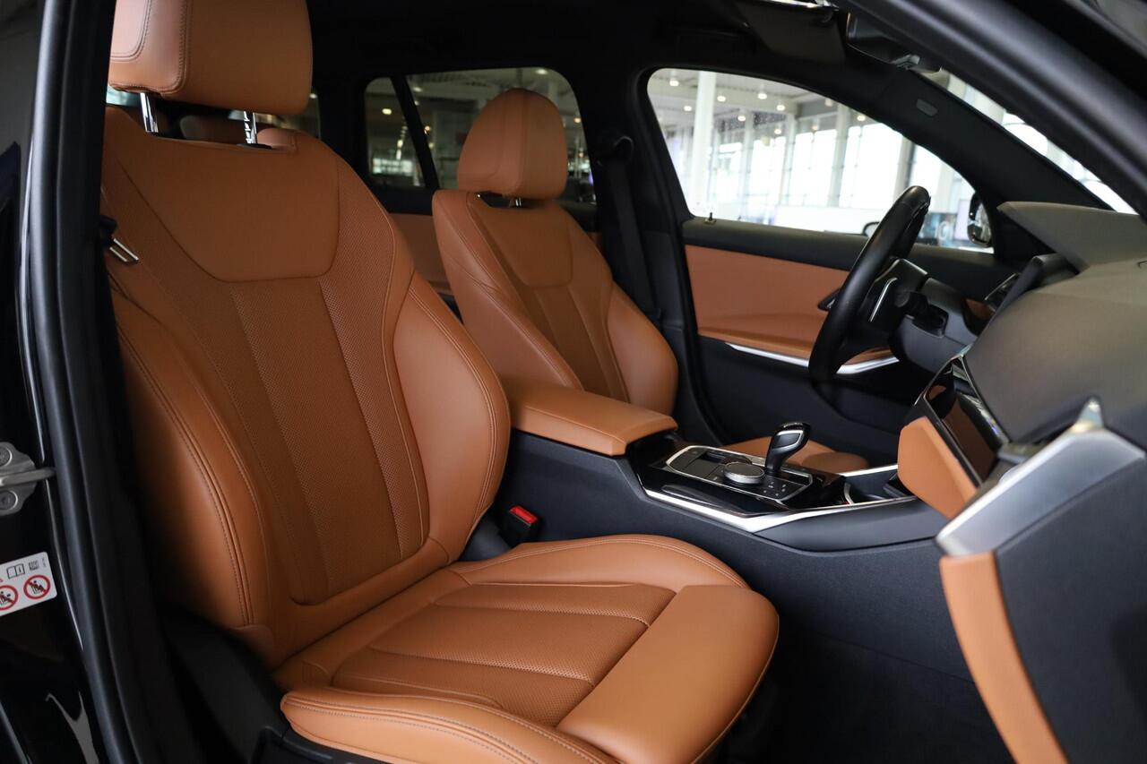 BMW 3-SERIE M340iA xDrive Touring | Head-Up Display | Stuurverwarming | Voorstoelen Verwarmd | Trekhaak