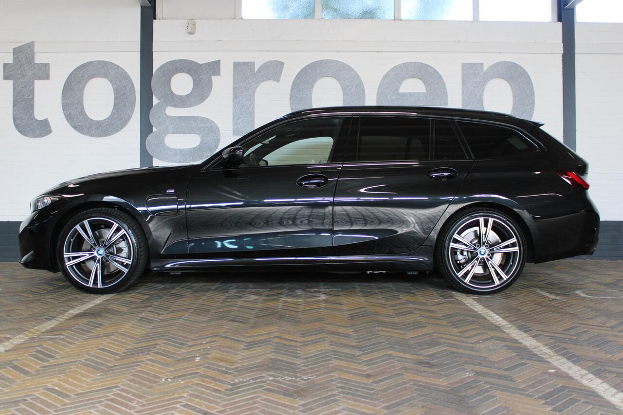 BMW 3-SERIE Touring 320e M-Sport | Incl. 12 maanden garantie | Assisted driving | Trekhaak uitklapbaar | Stoel/stuurverwarming | Climate control | Apple carplay/Android auto | Dealeronderhouden |