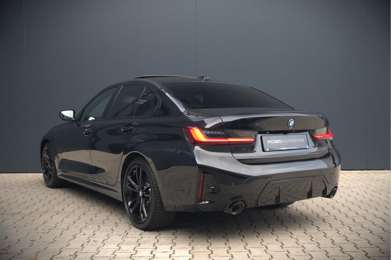 BMW 3-SERIE 320e High Executive M Sport | Panoramadak | Harman Kardon | Carbon | Camera | Adaptive LED | Stoelverwarming | Stuurverwarming | Apple Carplay | Navigatie | Cruise Control | Memory Seat | Trekhaak | Keyless | Shadowline