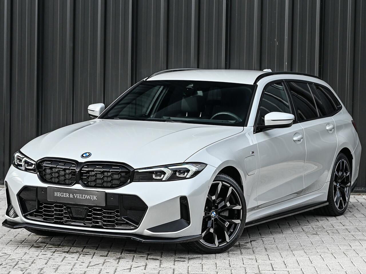 BMW 3-SERIE Touring 330e xDrive M-SPORT | FACELIFT | ACCU 19,5 kWh | ACTIVE CRUISE | ELEKTR. TREKHAAK | HIFI AUDIO | SHADOW LINE | CAMERA | FULL-LED | STUUR- EN STOELVERWARMING