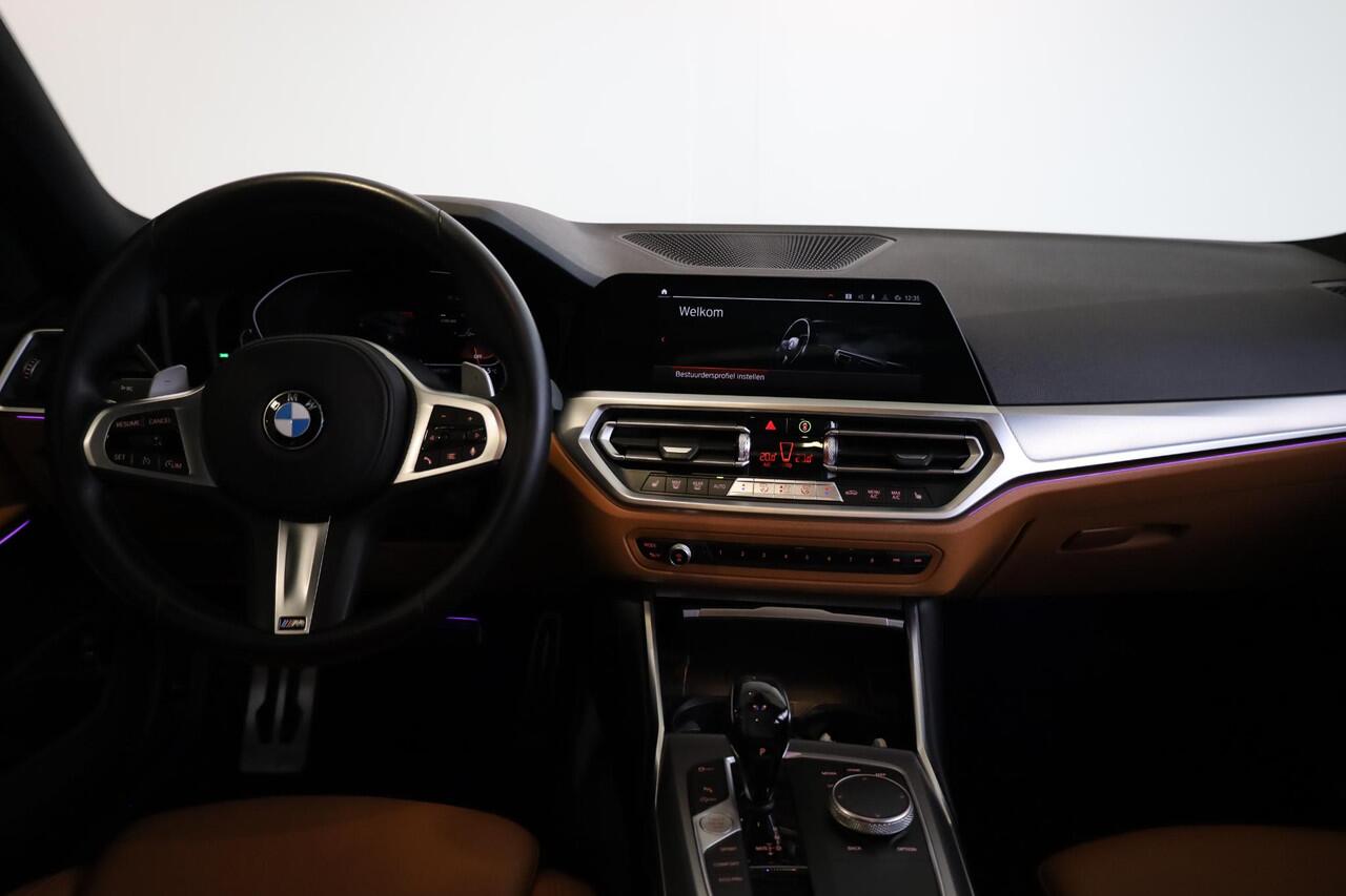 BMW 3-SERIE Touring 318i High Executive | M Sport | Elektrische Trekhaak | Glazen panoramadak | Achteruitrijcamera | HiFi | Shadowline