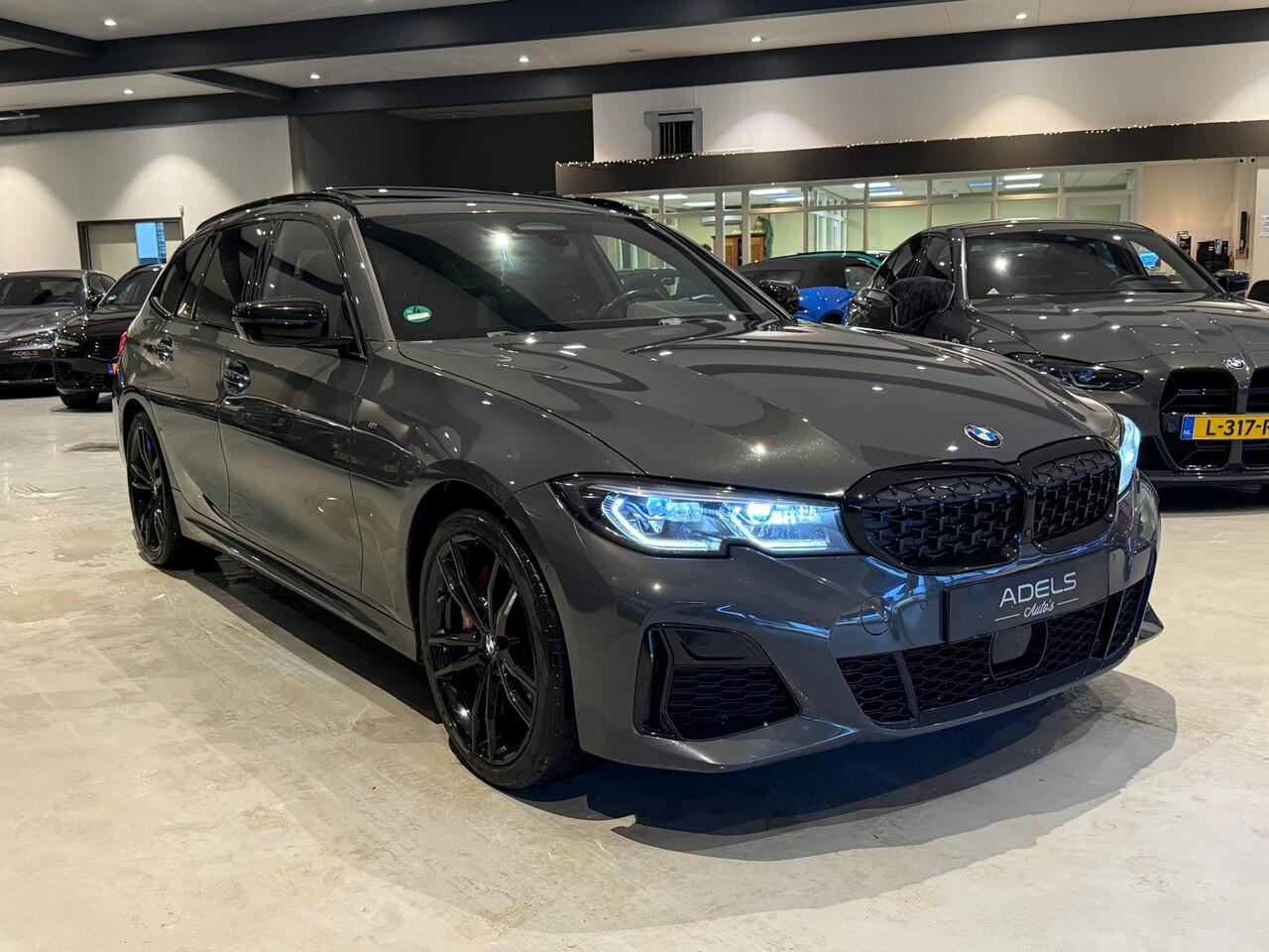BMW 3-SERIE Touring M340i xDrive Edition Plus Panodak Laser Trekhaak H/K Sound Carbon HUD 360Cam