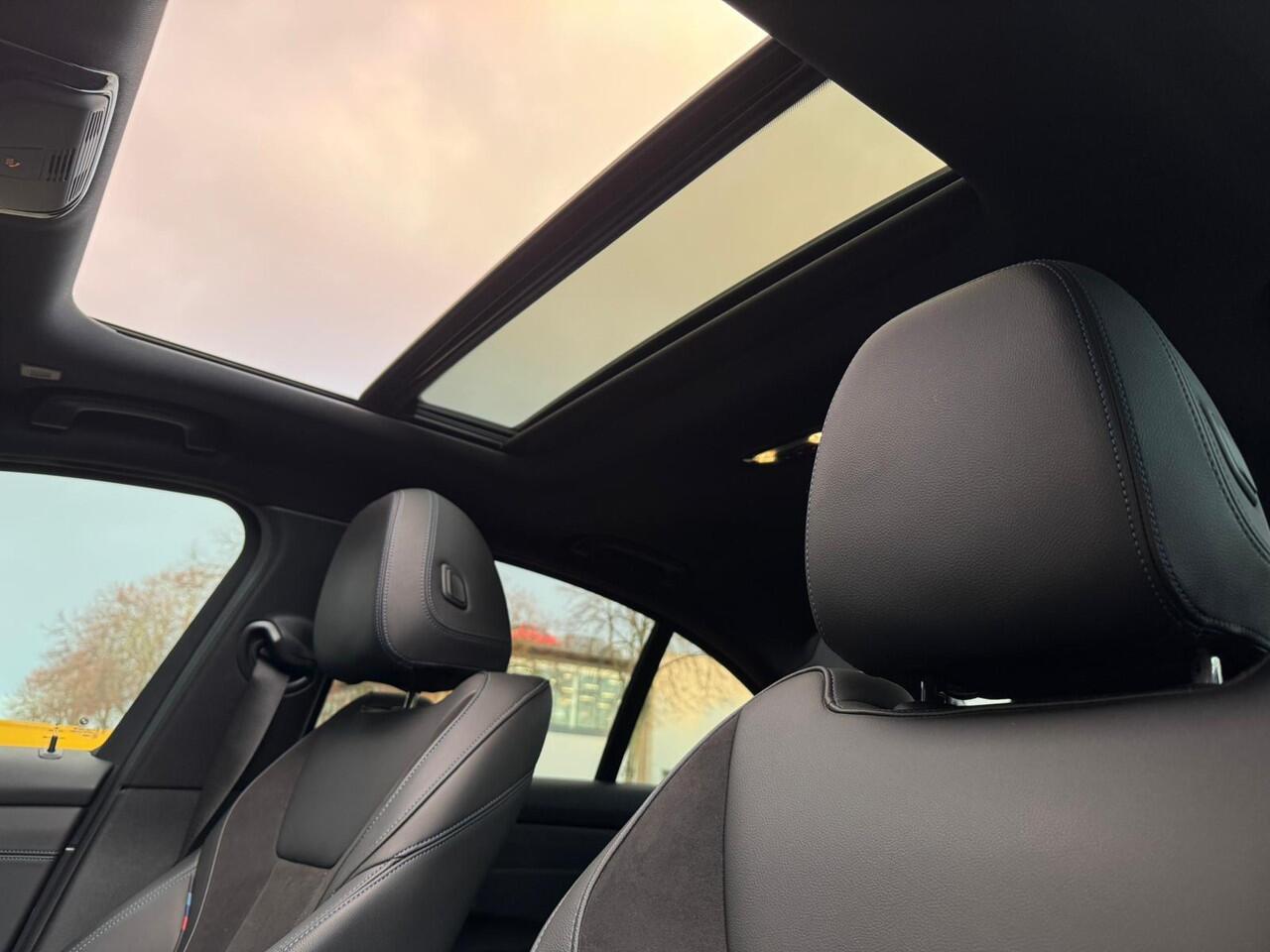 BMW 3-SERIE 330e High Executive |schuif dak | Harman-Kardon |Dravitgrau |