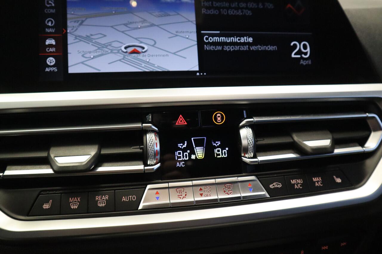 BMW 3-SERIE Touring 320i High Executive Edition Navigatie Full-led CruiseControl Stoelverwarming Sfeerverlichting 24 maanden garantie mogelijk (*vraag naar de voorwaarden)