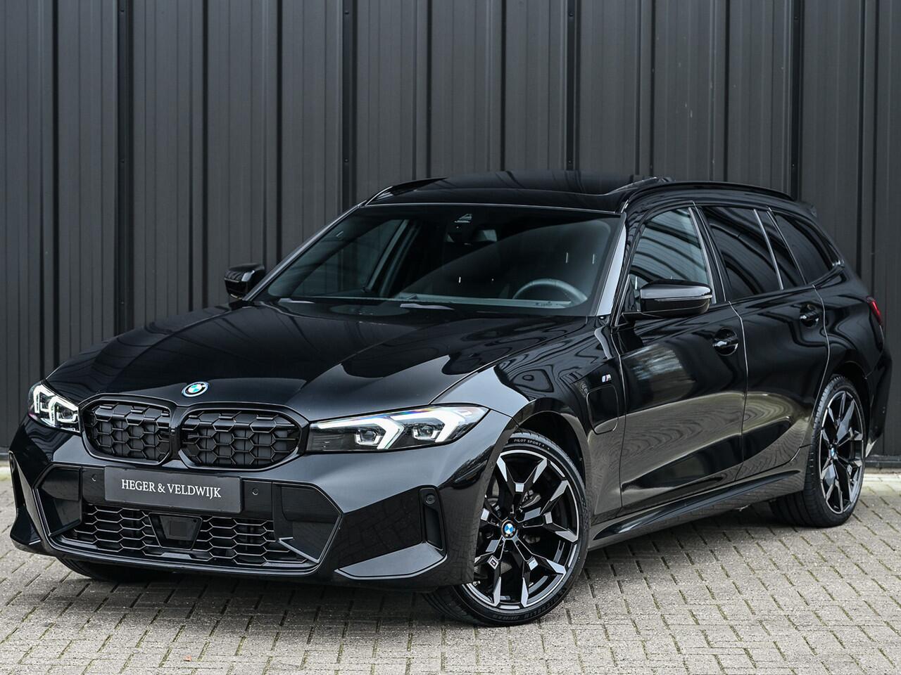 BMW 3-SERIE Touring 330e xDrive · M sport · Accu 19,5kWh · Trekhaak · Panoramadak · Active Cruise · Camera · Ambiance interieur ·