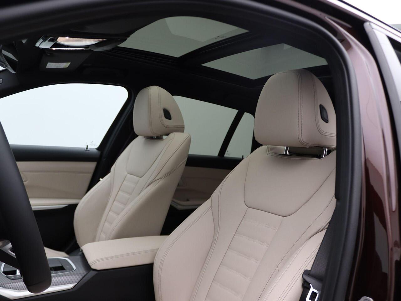 BMW 3-SERIE Touring 330e Individual Lak | M Sportpakket Pro | Innovation Pack | Comfort Pack | Trekhaak | Panoramadak