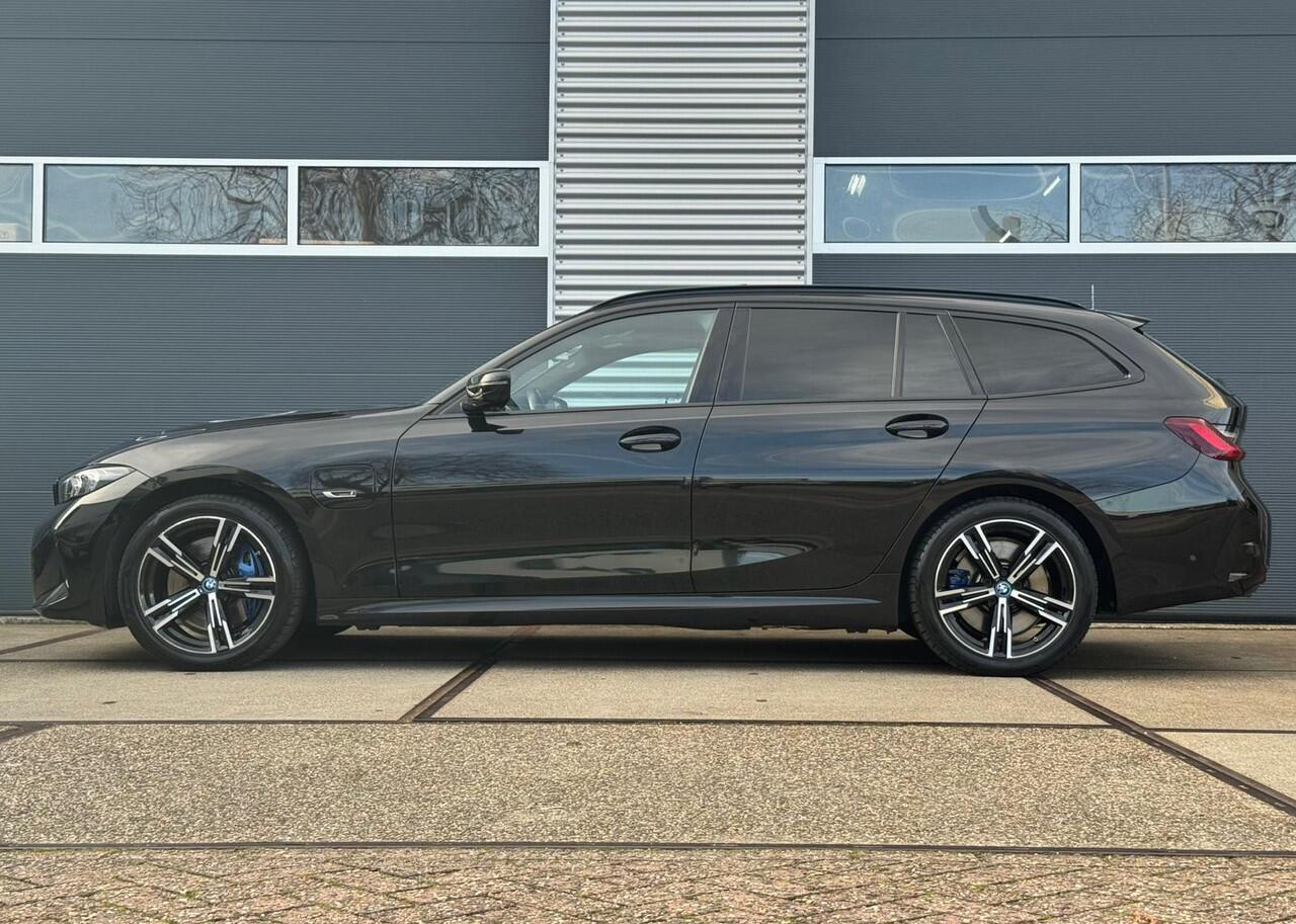 BMW 3-SERIE Touring 330e High Executive