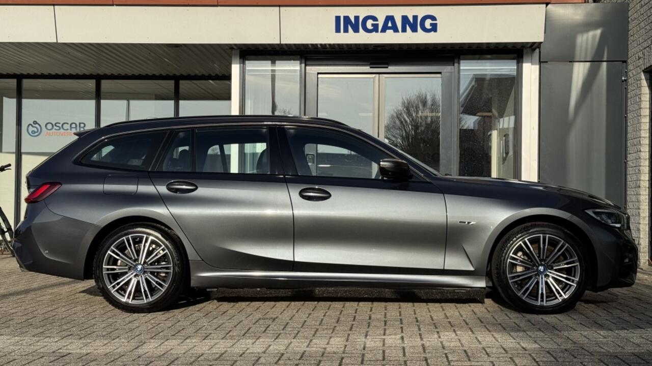 BMW 3-SERIE Touring 330e xDr. High Exec. | M-Sport | HUD | Leer | Navi