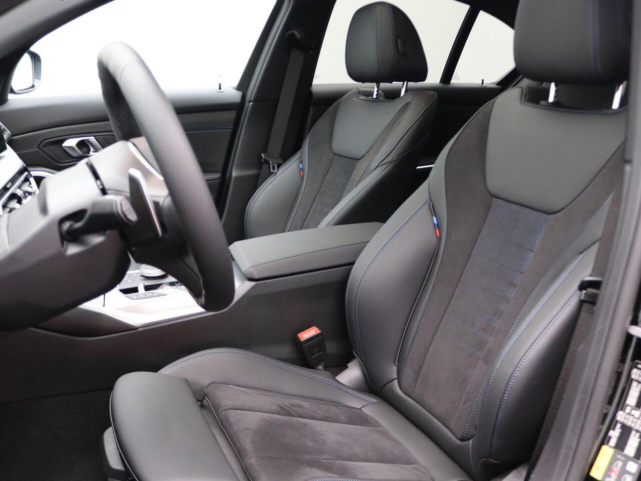 BMW 3-SERIE Sedan 320e M Sportpakket | Travel Pack | Innovation Pack | Entertainment Pack | Stuurwielrand verwarmd | Trekhaak | Schuifdak | 18'' | Ekris Selection