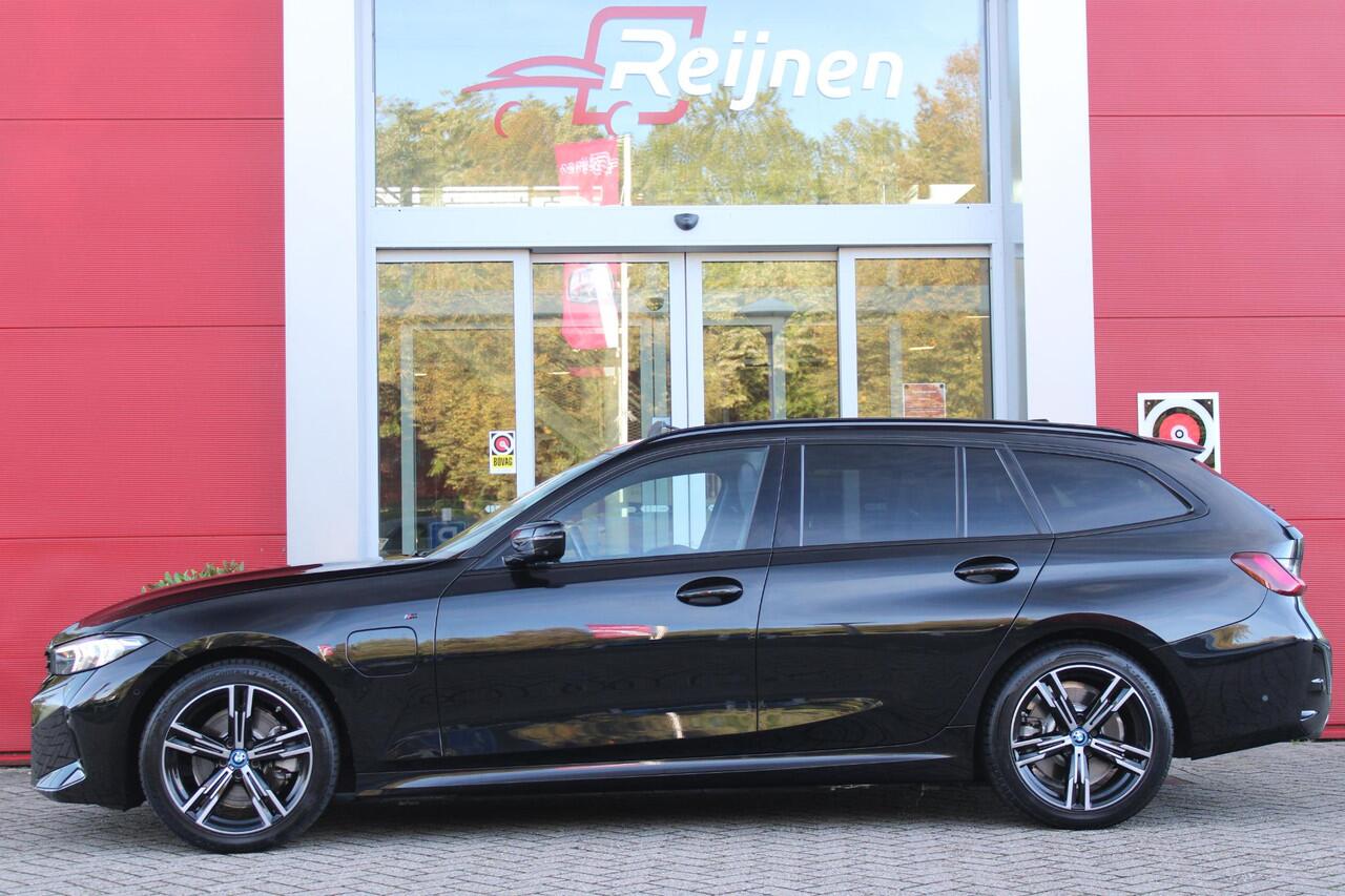 BMW 3-SERIE Touring 320e 205PK M-SPORT | PANORAMISCH SCHUIF/KANTEL DAK | M-SPORT PAKKET INTERIEUR/EXTERIEUR | SFEER VERLICHTING | ELEKTRISCH BEDIENBARE VOORSTOELEN MET GEHEUGEN OP DE BESTUURDERSSTOEL | STOEL VERWARMING | HEAD UP DISPLAY | CRUISE CONTROL | NAVIGATIE |