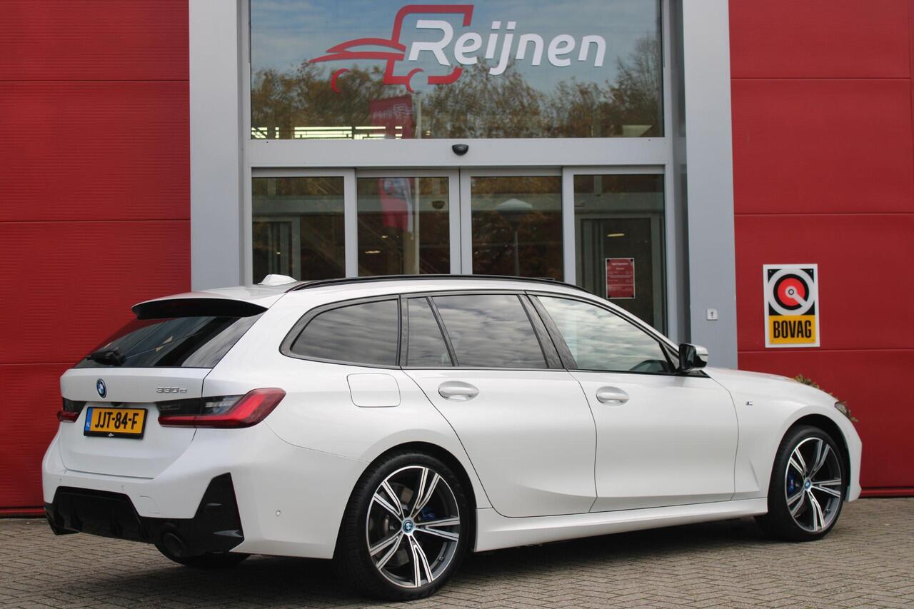 BMW 3-SERIE Touring 330e 292PK M-SPORT | PANORAMISCH SCHUIF/KANTEL DAK | M-SPORT PRO-PAKKET | M-SPORT REMMEN UITGEVOERD IN DONKERBLAUW MET M LOGO | BMW LIVE COCKPIT PROFESSIONAL | CURVED DISPLAY |DRIVING ASSISTANT INCL. HEAD-UP DISPLAY | PARKING ASSIST INCL. ACHTERUI