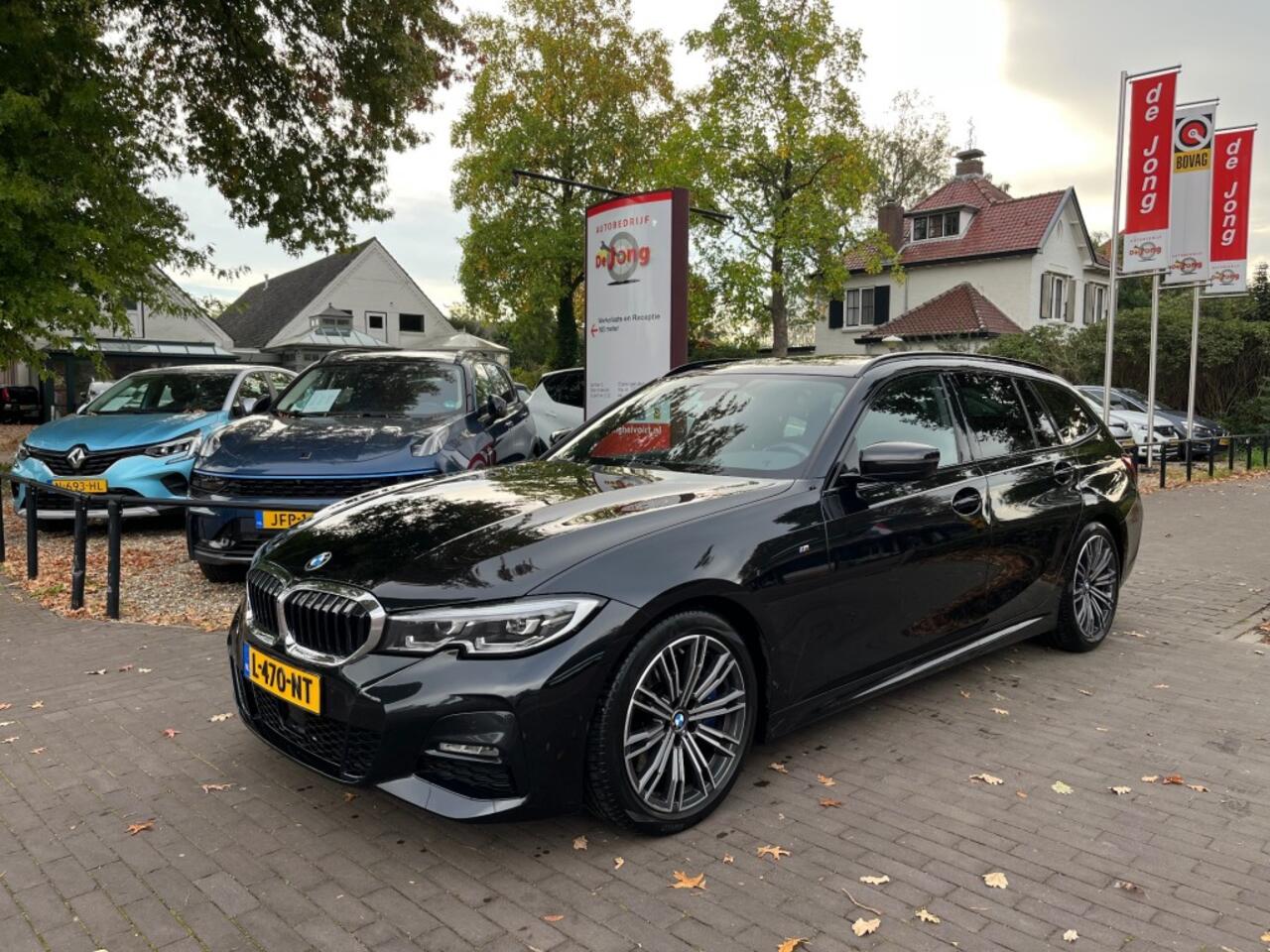 BMW 3-SERIE TOURING 330I HIGH EXECUTIVE M-PAKKET / SCHUIFDAK / NAVI / DAB