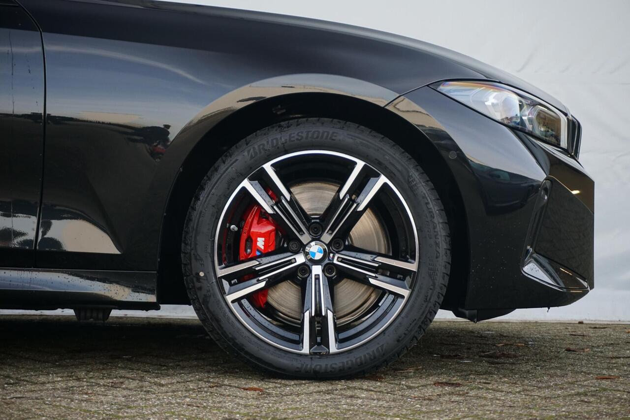 BMW 3-SERIE Touring 330e M Sport Pro | Trekhaak / Harman Kardon / Elektrische Stoelen met geheugen / Comfort Access