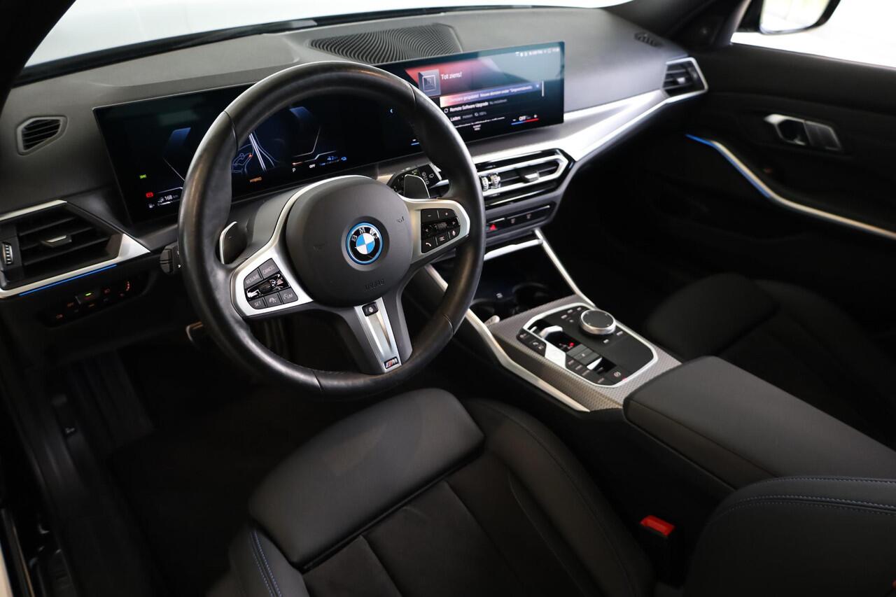 BMW 3-SERIE Touring 320e | Elektrisch Glazen Panorama-dak | M Sportpakket | cruise control adaptief met Stop&Go | Travel Pack