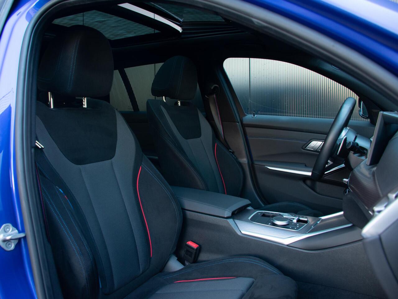 BMW 3-SERIE Touring 330e l Long Range l Trekhaak l M-sport l Schuif-/kantel dak l Adaptive LED l Verwarmd Stuurwiel l Head-Up l 20"