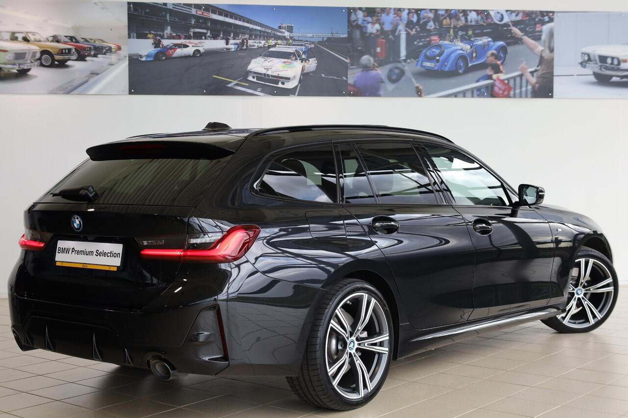 BMW 3-SERIE Touring 320e | Elektrisch Glazen Panorama-dak | M Sportpakket | cruise control adaptief met Stop&Go | Travel Pack