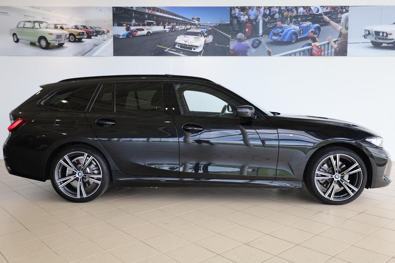 BMW 3-SERIE Touring 320e | Elektrisch Glazen Panorama-dak | M Sportpakket | cruise control adaptief met Stop&Go | Travel Pack