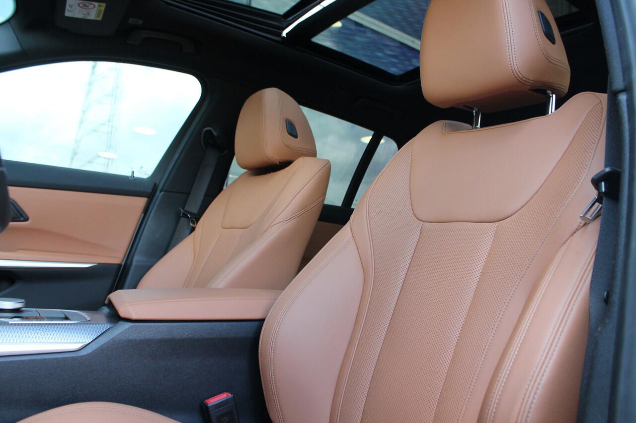 BMW 3-SERIE Touring 330e High Executive M Sport Automaat / Panoramadak / Trekhaak / Sportstoelen / Active Cruise Control / Adaptieve LED / Parking Assistant Plus / M Adaptief onderstel