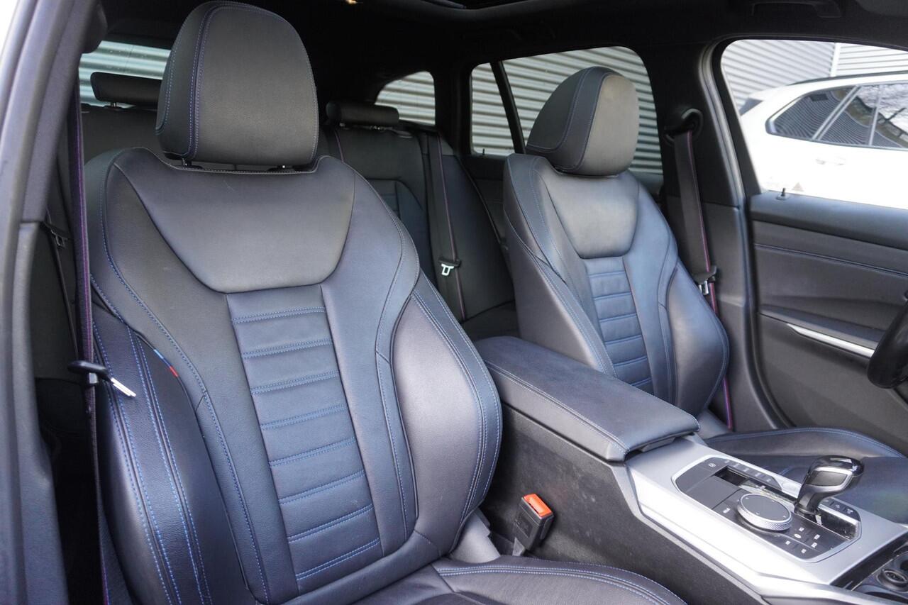 BMW 3-SERIE Touring M340i xDrive High Executive | Parking Pack | Glazen panoramadak | HiFi System | Trekhaak met elektrisch wegklapbare kogel | BMW Head-Up Display