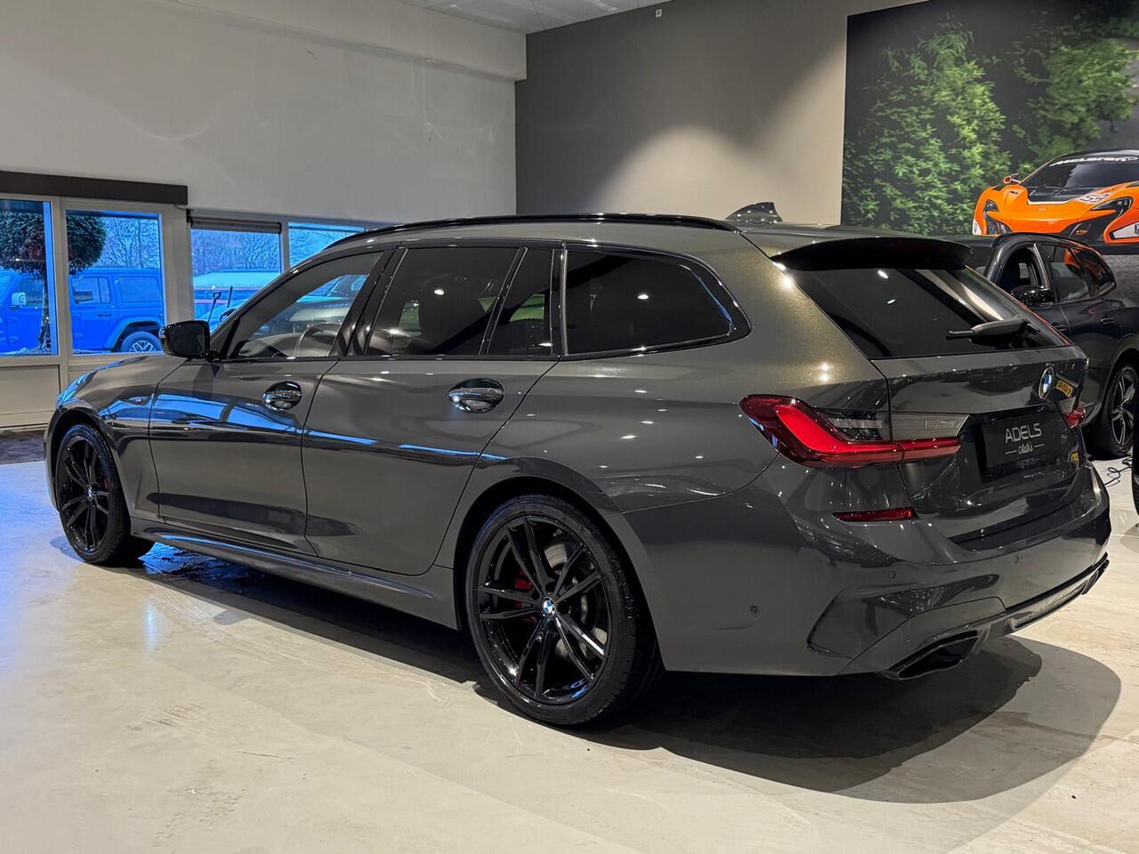 BMW 3-SERIE Touring M340i xDrive Edition Plus Panodak Laser Trekhaak H/K Sound Carbon HUD 360Cam