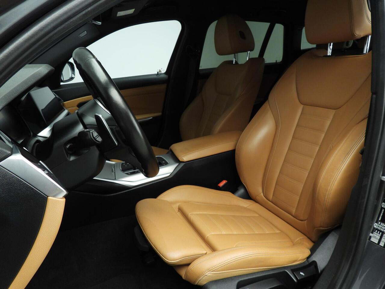 BMW 3-SERIE Touring 318i | M-Sportpakket | Laserlicht | Leder | Navigatie | Sportstoelen | Stoelverwarming | DAB | Alu 18 inch