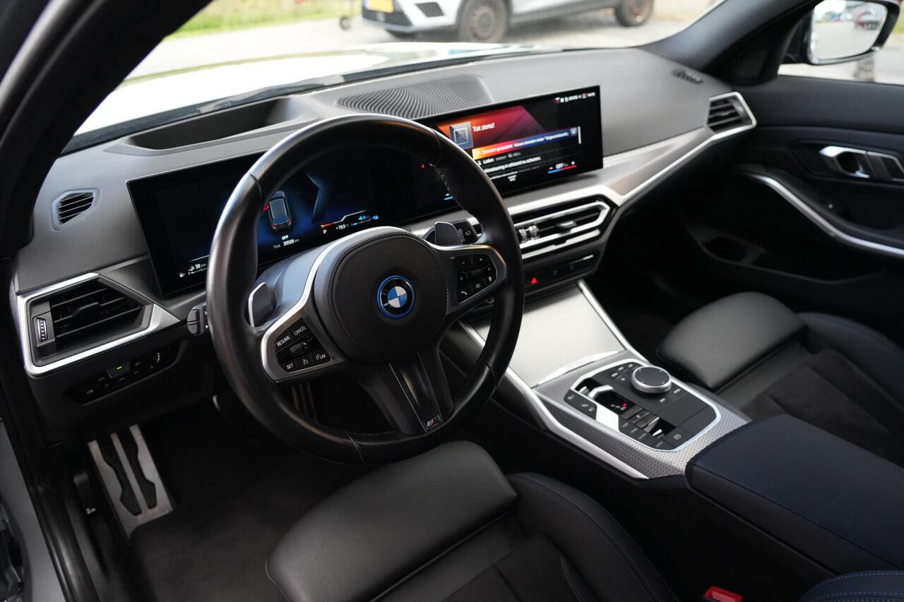 BMW 3-SERIE Touring 330e M Sport High Executive 292pk Navigatie/Stoelverwarming/Camera