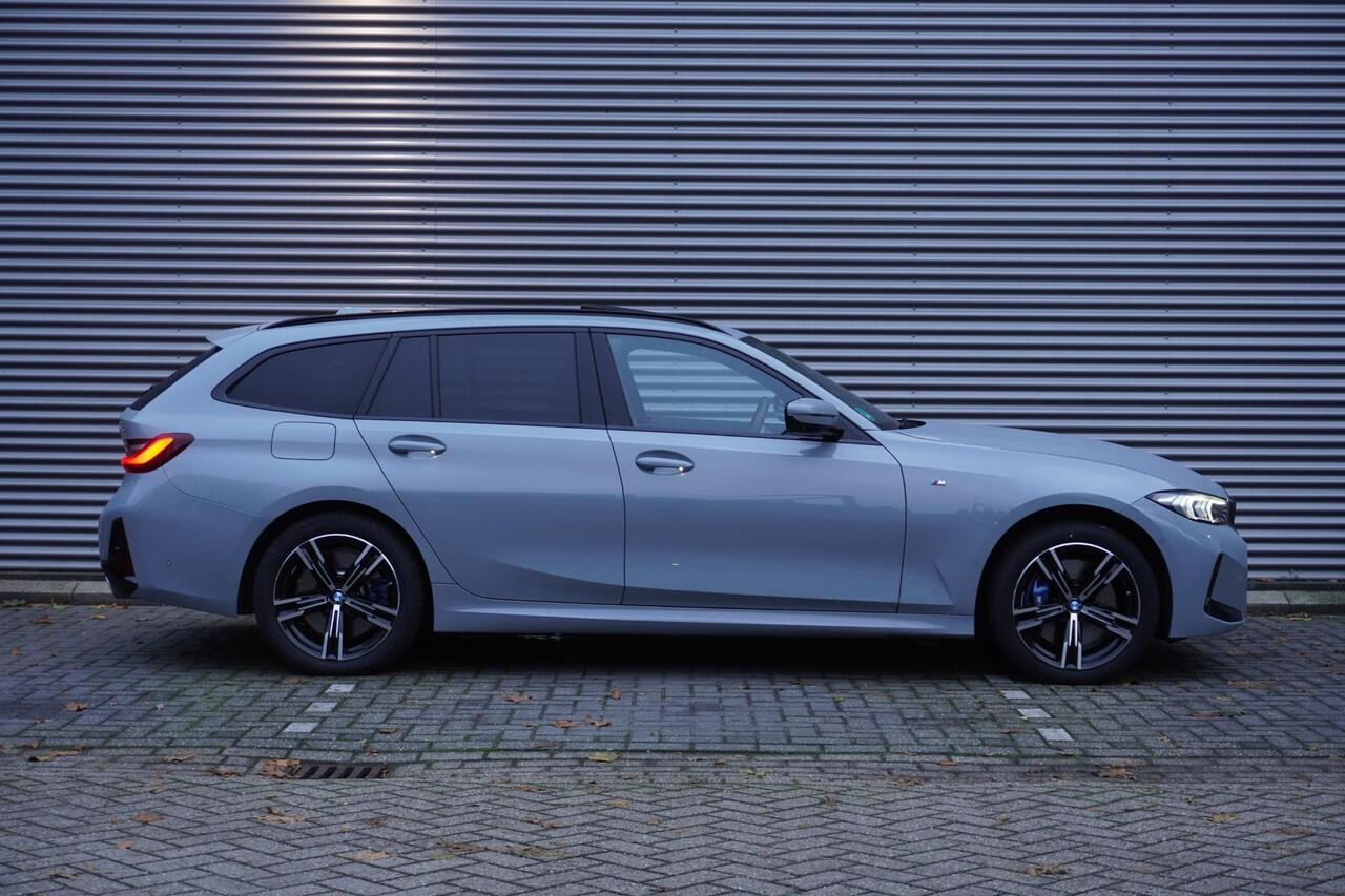 BMW 3-SERIE Touring 330e Xdrive M Sportpakket | Trekhaak met elektrisch wegklapbare kogel | Glazen panoramadak | HIFI System Harman Kardon | Comfort Access