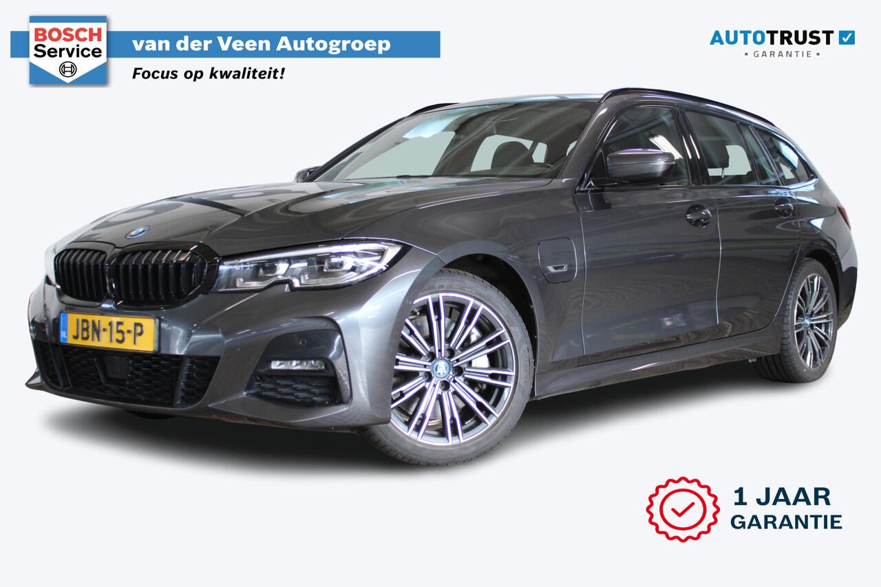 BMW 3-SERIE Touring 330e Business Edition Plus Adaptieve cruise control | Climate control | Stoel/stuur verwarming | Zomer + winterset | Elektrisch uitklapbare trekhaak | Parkeercamera |