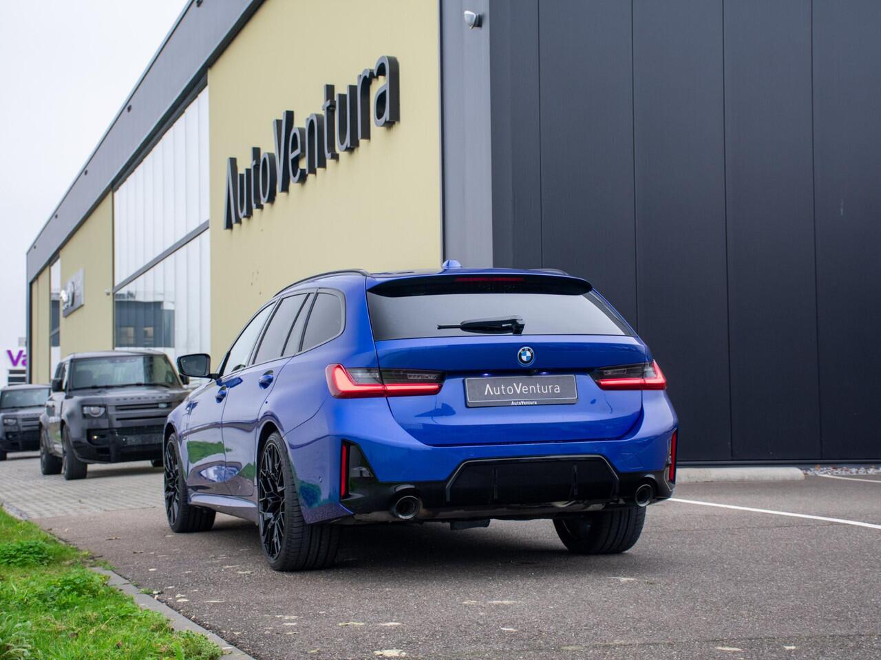 BMW 3-SERIE Touring 330e LC-2 l Long Range l Trekhaak l M-sport l Pano l Verwarmd Stuurwiel l Head-Up l 20"