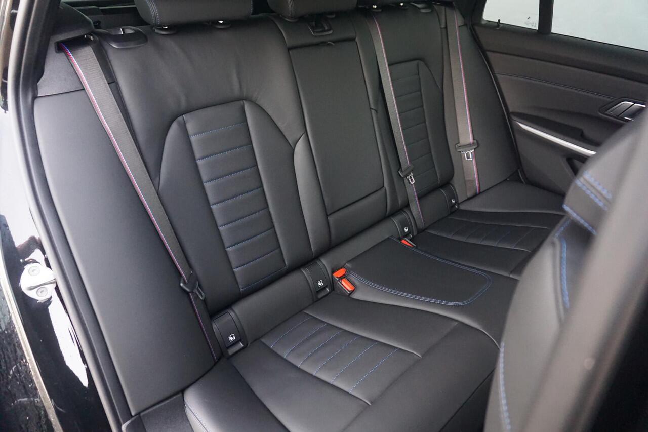 BMW 3-SERIE Touring 330e M Sport Pro | Trekhaak / Harman Kardon / Elektrische Stoelen met geheugen / Comfort Access