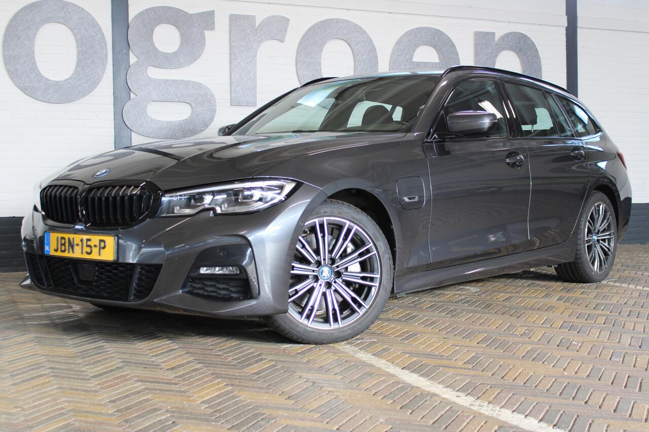 BMW 3-SERIE Touring 330e Business Edition Plus Adaptieve cruise control | Climate control | Stoel/stuur verwarming | Zomer + winterset | Elektrisch uitklapbare trekhaak | Parkeercamera |