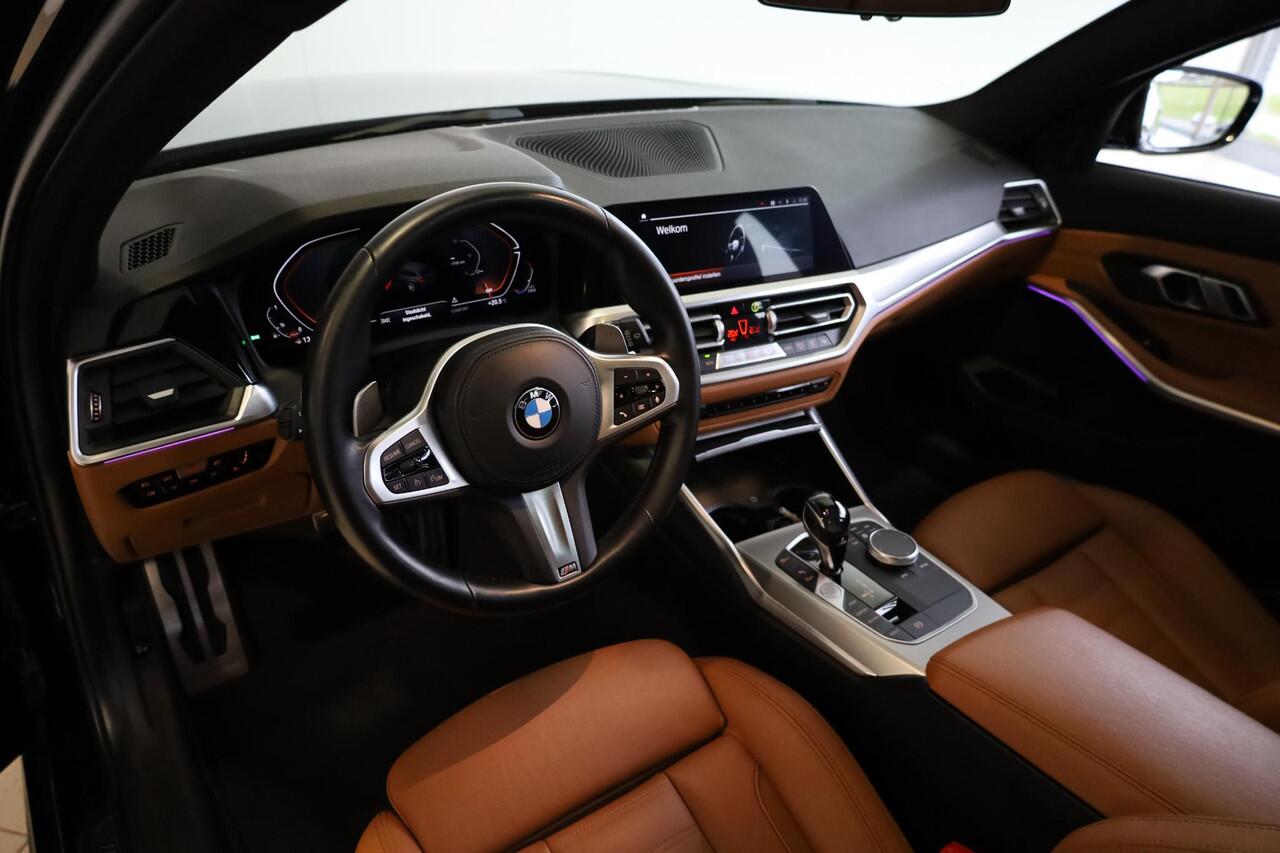 BMW 3-SERIE Touring 318i High Executive | M Sport | Elektrische Trekhaak | Glazen panoramadak | Achteruitrijcamera | HiFi | Shadowline