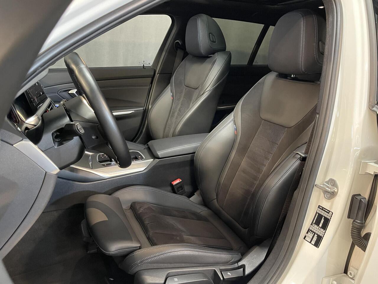 BMW 3-SERIE Touring 318i High Executive M Sport 18"/Panoramadak/Laser LED/Harman Kardon/Dodehoek/Adaptieve cruise/Keyless/Stoelverwarming