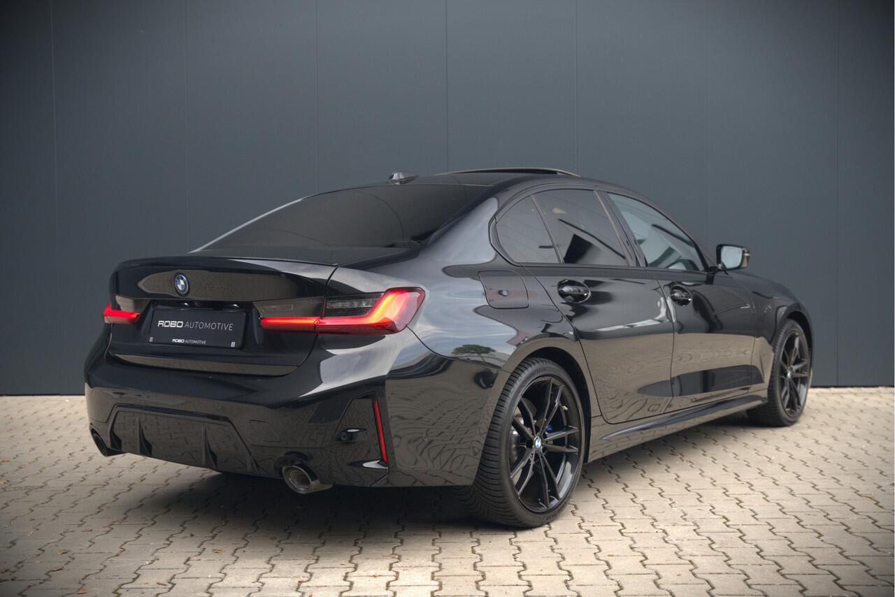 BMW 3-SERIE 320e High Executive M Sport | Panoramadak | Harman Kardon | Carbon | Camera | Adaptive LED | Stoelverwarming | Stuurverwarming | Apple Carplay | Navigatie | Cruise Control | Memory Seat | Trekhaak | Keyless | Shadowline