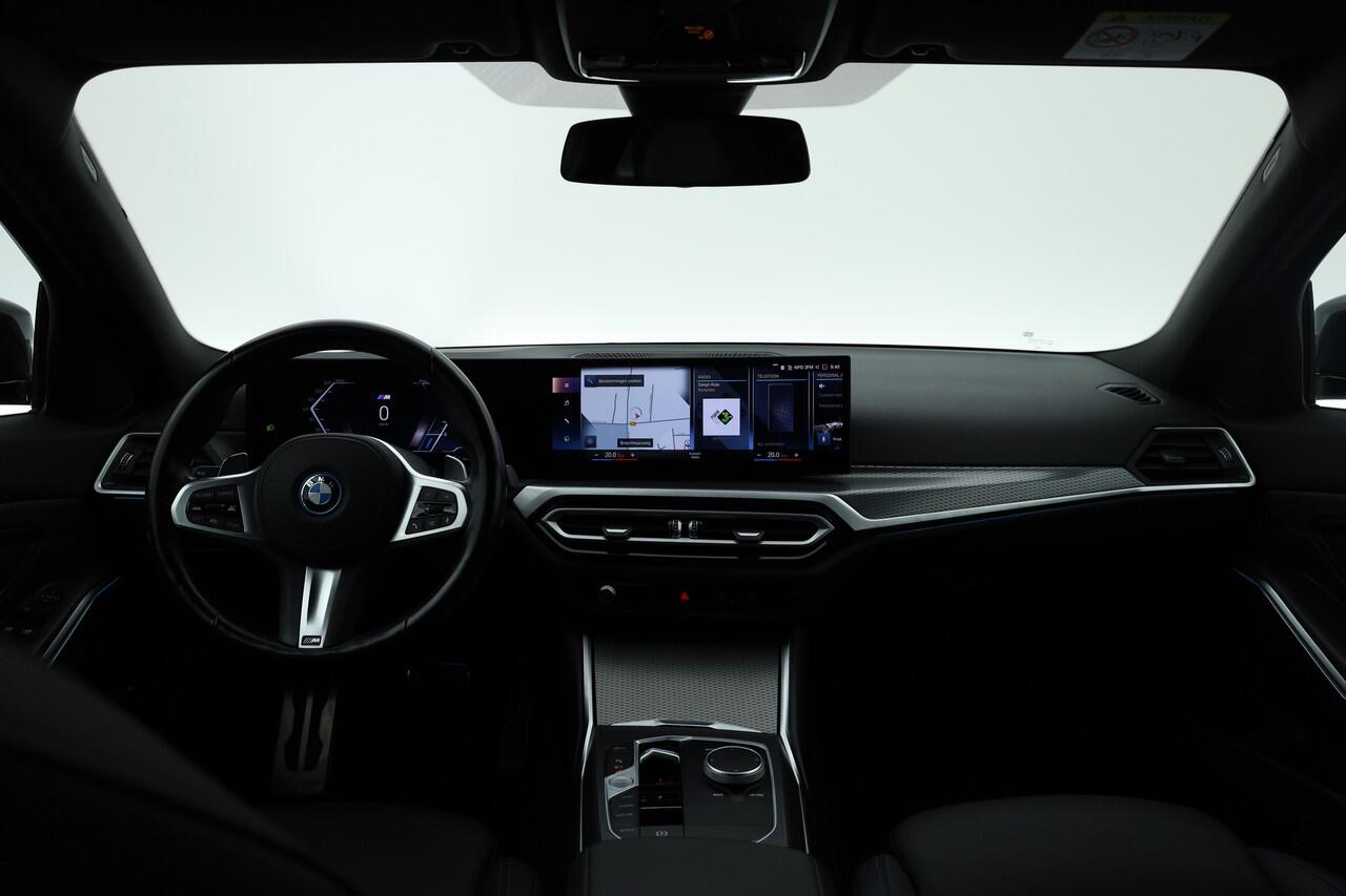 BMW 3-SERIE Touring 320e M Sport | Facelift | Shadow Line | Curved display | Adapt. Cruise | Nav + CarPlay | Elek. Klep | Sfeerverlichting | LED | Stoelverw. | PDC V