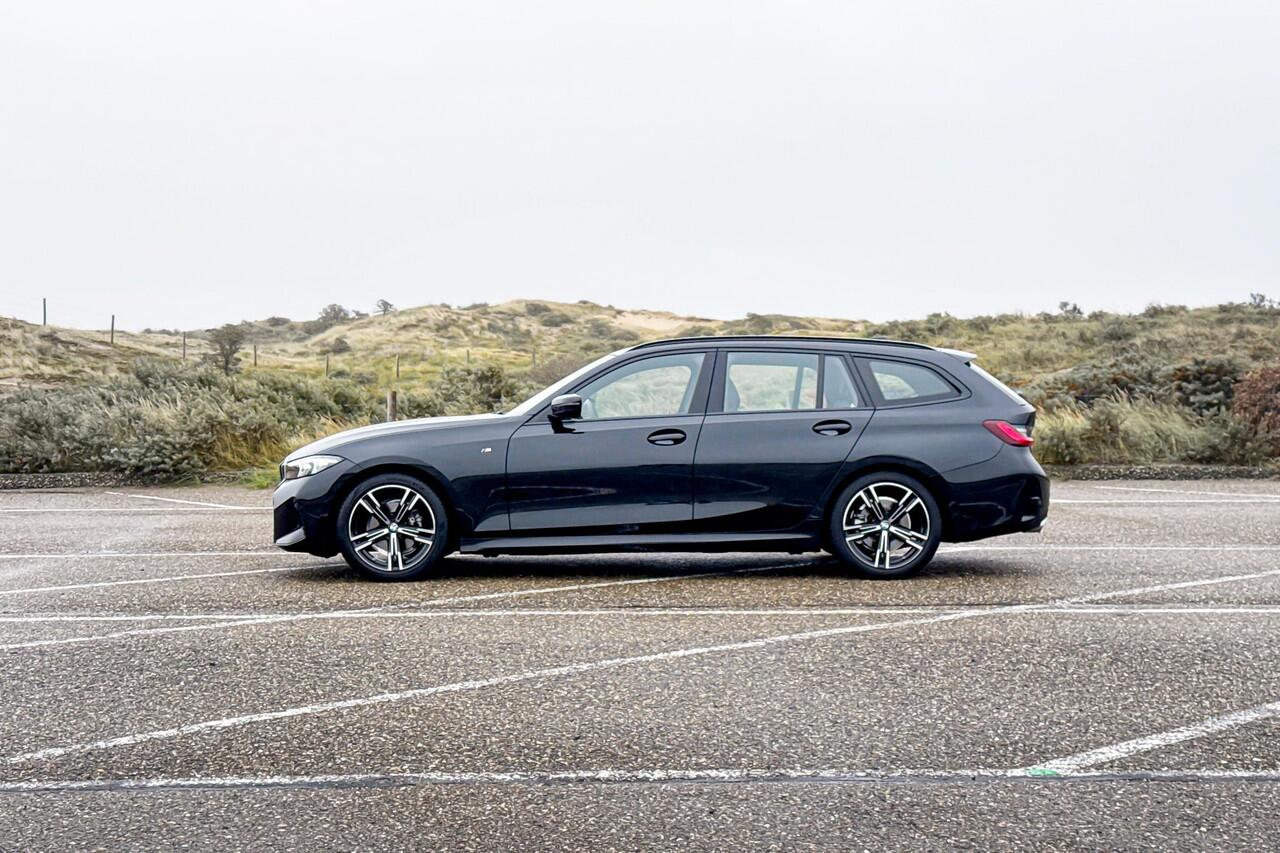 BMW 3-SERIE Touring 318i | M Sport | Stoelverwarming | Trekhaak |