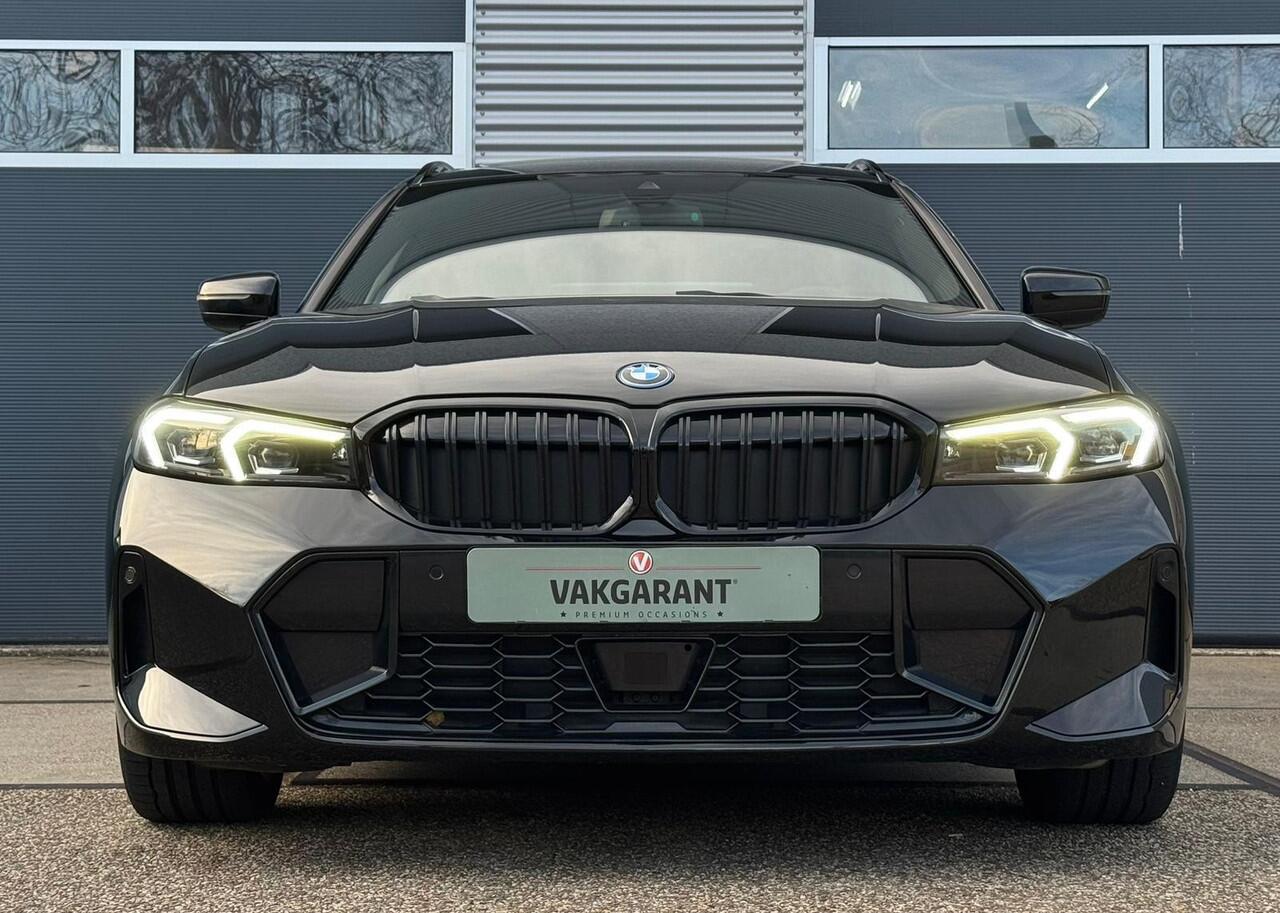 BMW 3-SERIE Touring 330e High Executive