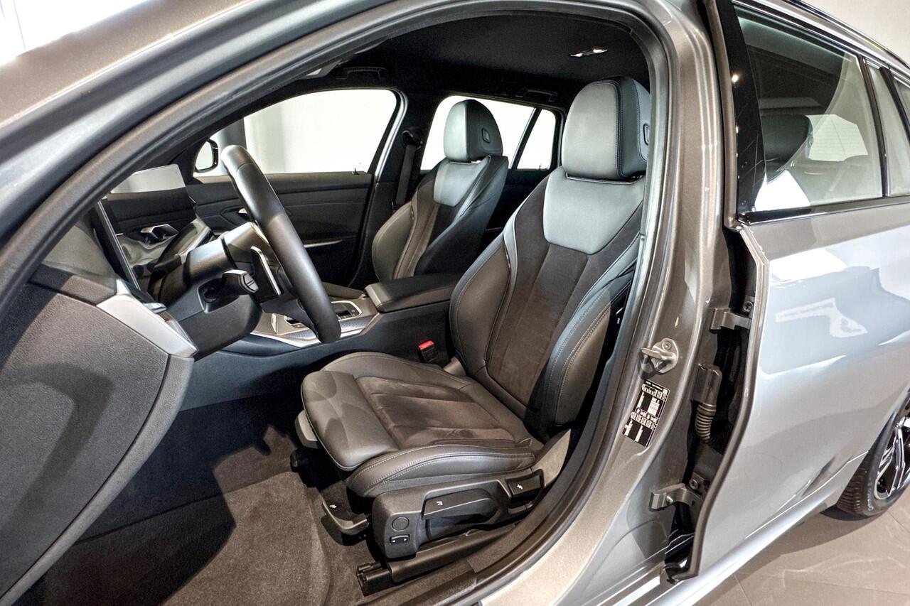 BMW 3-SERIE Touring 318i | M Sport | Stoelverwarming | Achteruitrijcamera | Trekhaak |