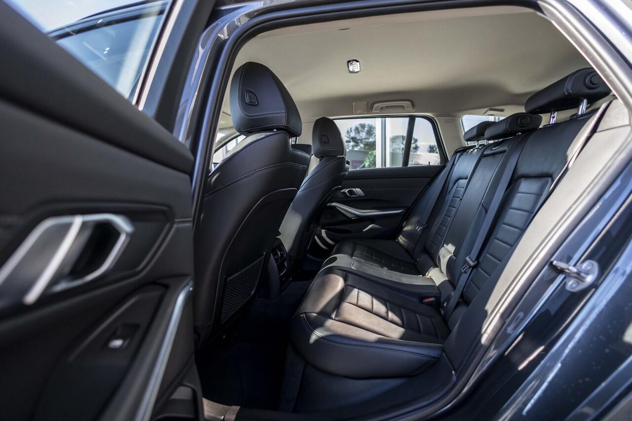 BMW 3-SERIE Touring 320e Business Edition Plus | Leder | Camera