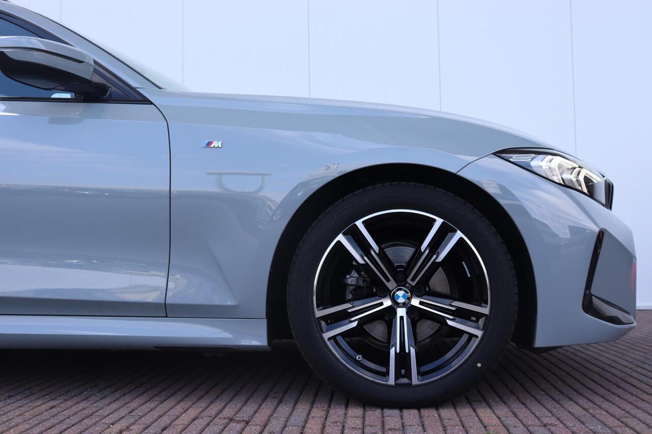 BMW 3-SERIE Touring 318i M Sportpakket/ 19 inch LMV/ panoramadak/ Sportstoelen/ Cruise Control/ HiFi/ Getint Glas/ Ambiance verlichting