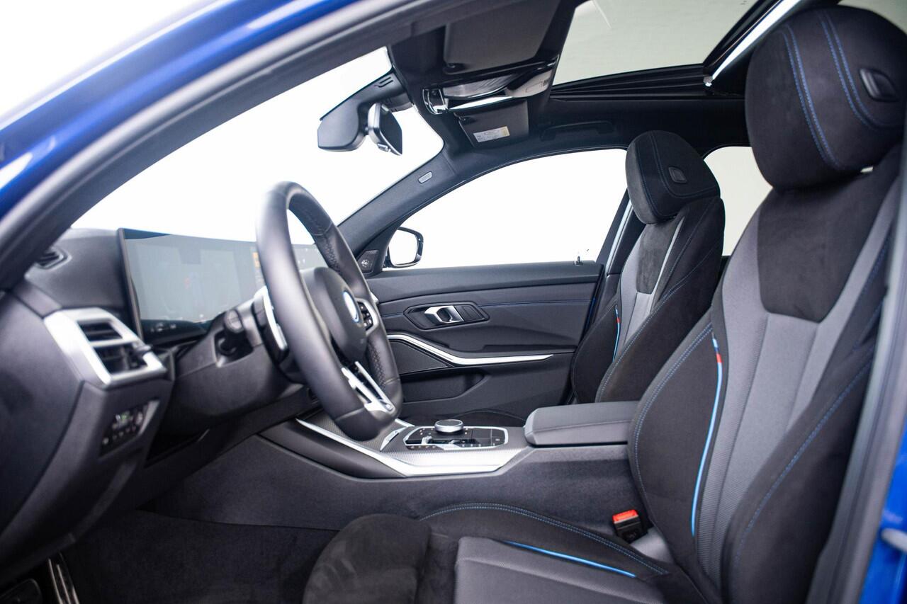 BMW 3-SERIE Touring 330e Long Range - M Sport - Trekhaak - Panoramadak - Elektrisch verstelbare/verwarmde stoelen - Parking/Driving Assistant - Harman Kardon - Getinte ruiten - Comfort Access - Ambiance verlichting -