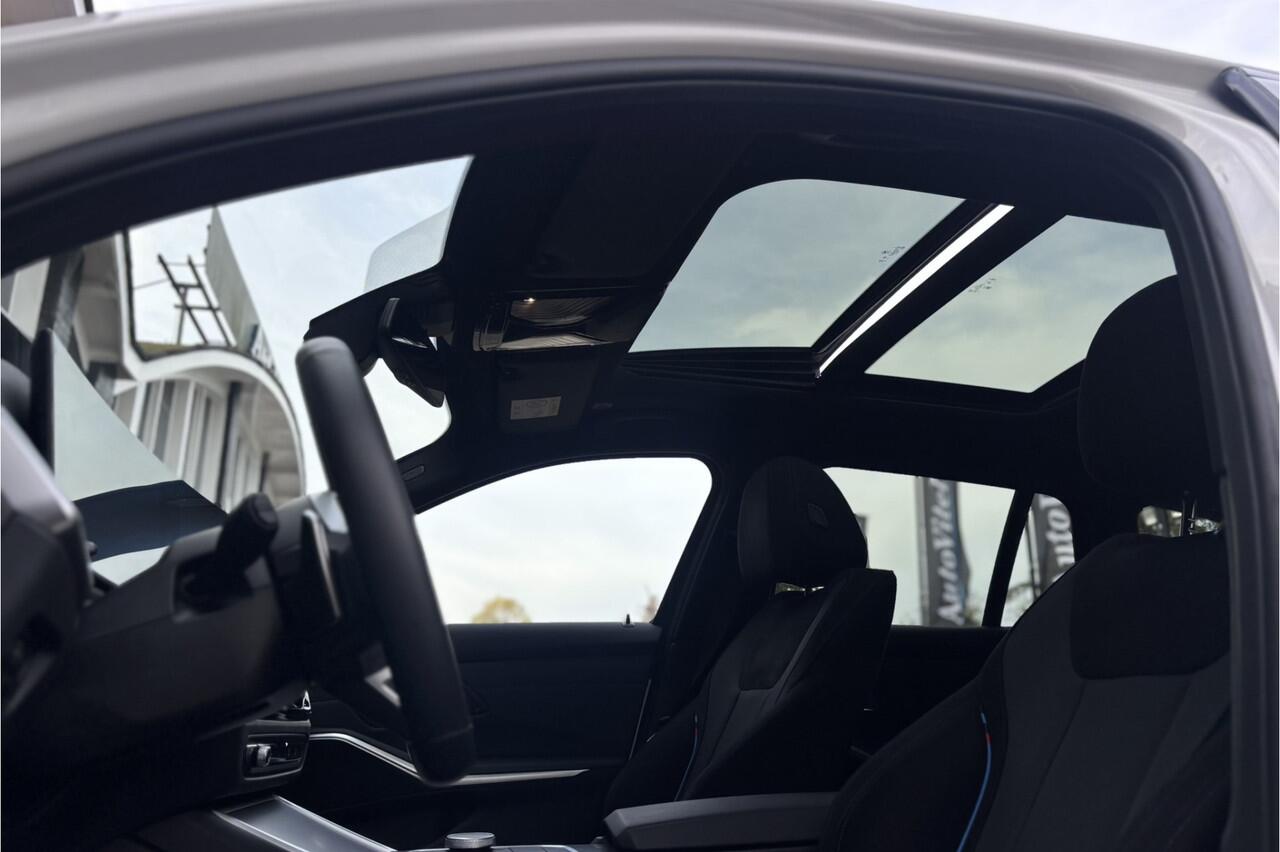 BMW 3-SERIE Touring 330e M-Sport | 19,5 kWh Accu | Panodak | Head-Up | Memory | Trekhaak | 360° Camera | Fabrieksgarantie