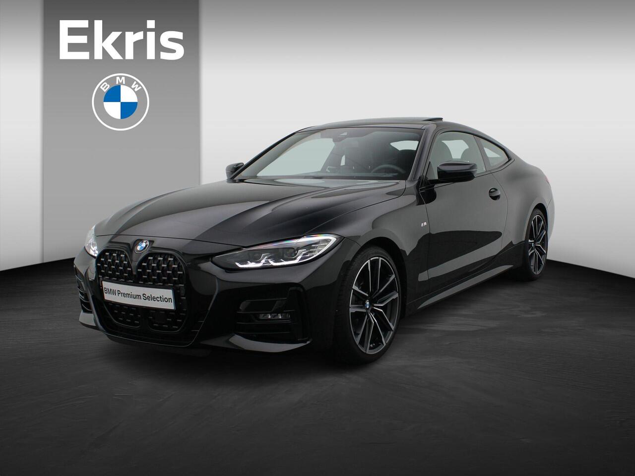BMW 4-SERIE Coupé 420i High Executive | M Sportpakket | Safety Pack | Stuurwielrand Verwarmd | Schuifdak | Driving Assistant | DAB | HiFi | 19''