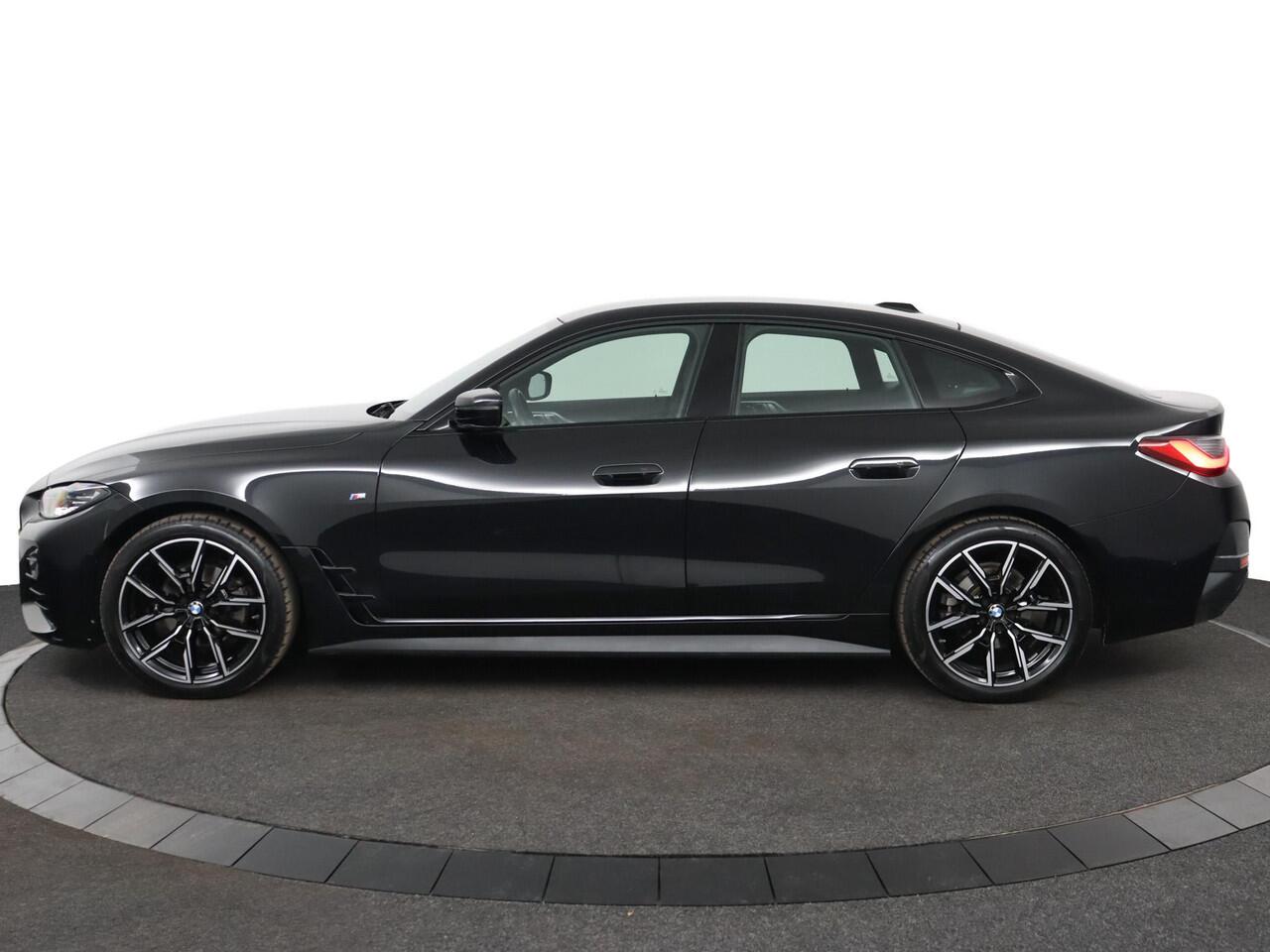 BMW 4-SERIE Gran Coupé 420i Business Edition Plus | M Sportpakket | Achteruitrijcamera | keyless entry | Voorstoelen verwarmd |