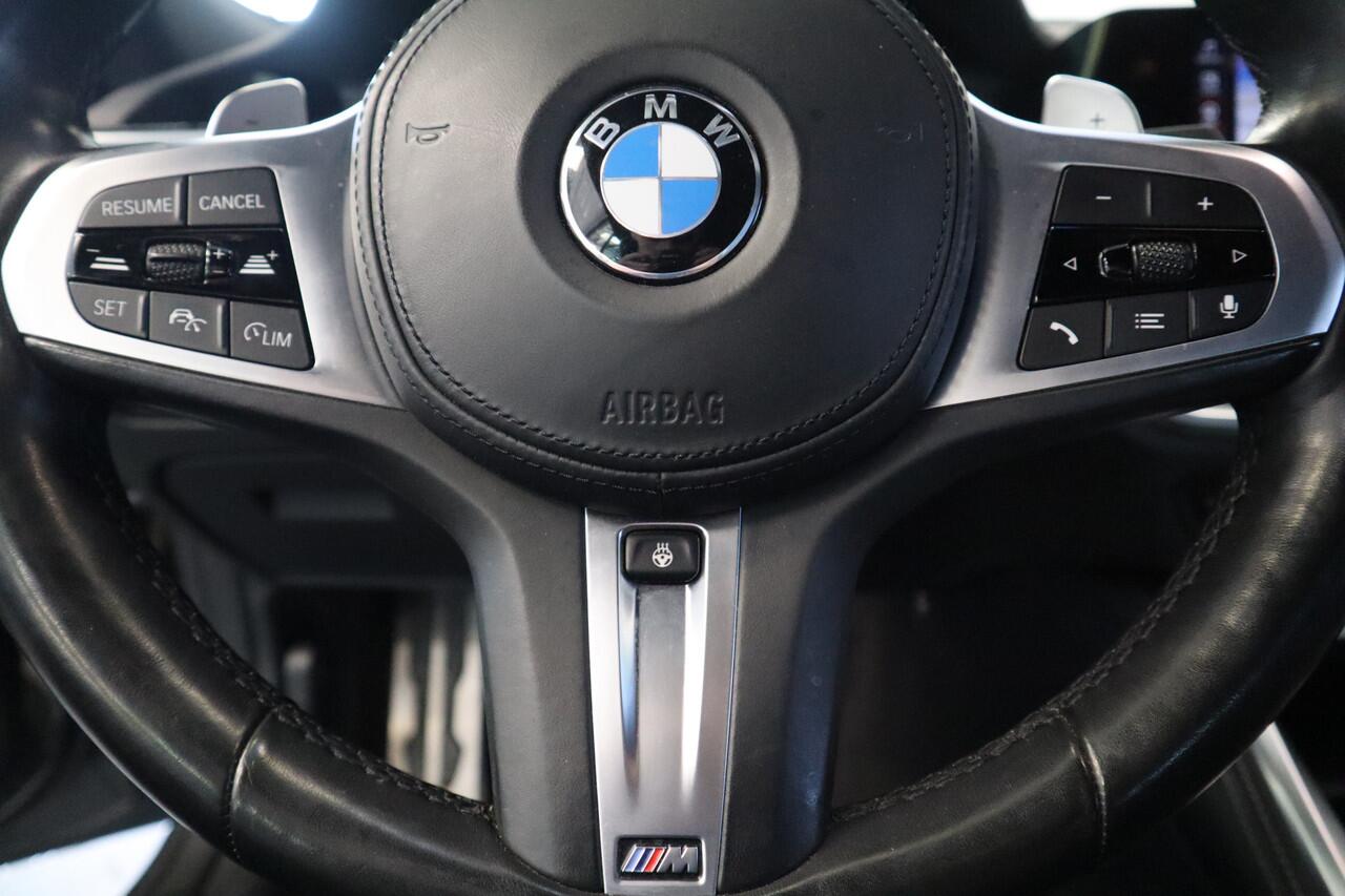 BMW 4-SERIE Cabrio M440i xDrive High-Executive 374PK Individueel-lak Navigatie Volleder 19LMV Head up