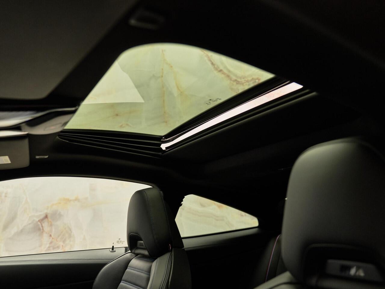 BMW 4-SERIE Coupé M440i M Sport Pro, 20", schuifdak, M stoelen, H/K, laser, HUD, ACC, leder, keyless