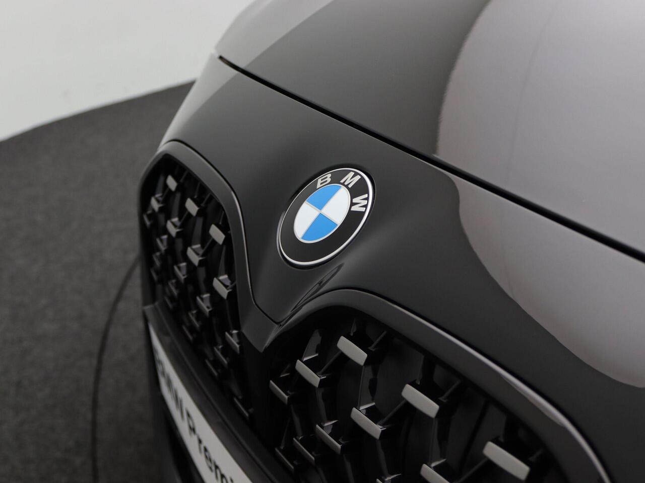 BMW 4-SERIE Coupé 420i High Executive | M Sportpakket | Safety Pack | Stuurwielrand Verwarmd | Schuifdak | Driving Assistant | DAB | HiFi | 19''