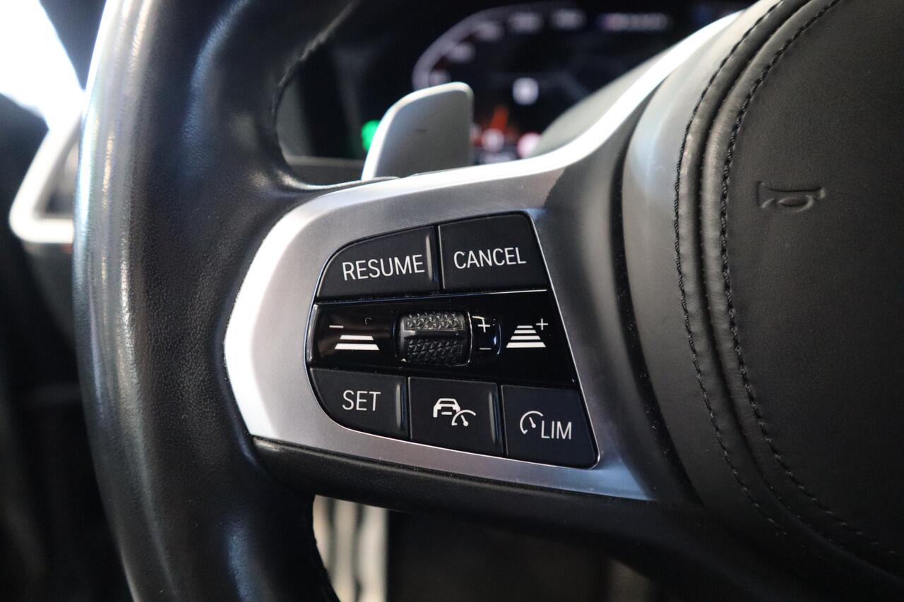 BMW 4-SERIE Cabrio M440i xDrive High-Executive 374PK Individueel-lak Navigatie Volleder 19LMV Head up