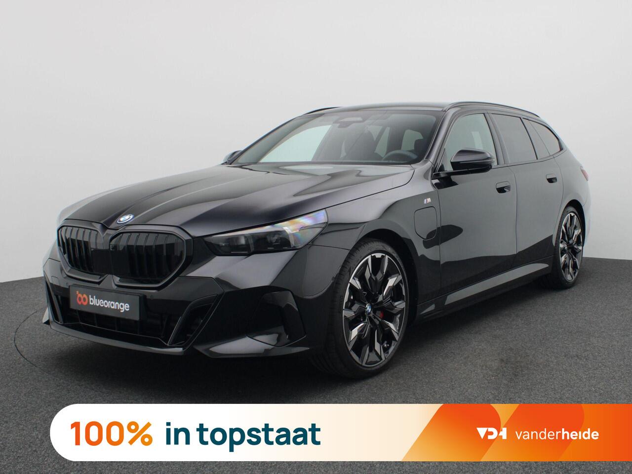 BMW 5-SERIE Touring 530e M Sport Pro Edition 299PK AUT. Panoramadak, Keyless, Memorystoel, Head-Up Display, Elektr. Achterklep, Stoelverwarming+Koeling, Stuurverwarming, Volleder, Trekhaak, 21" LM Velgen